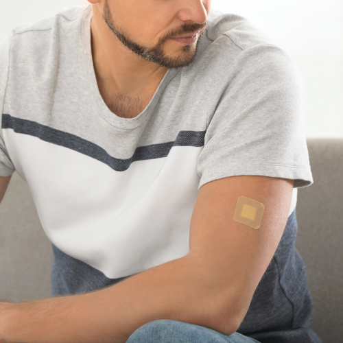 a man using a nicotine patch