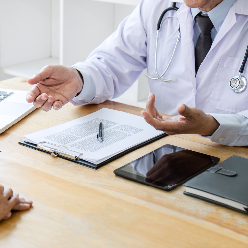 A doctor prescribing a treatment plan